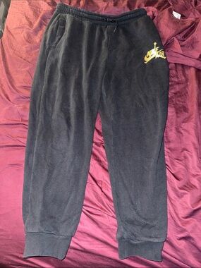 Jordan Nike Black Sweatpants with Yellow Air Jordan Logo